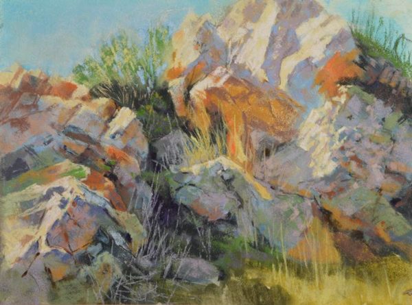 plein air soft pastel painting of sunlit boulders by Sharon Bamber