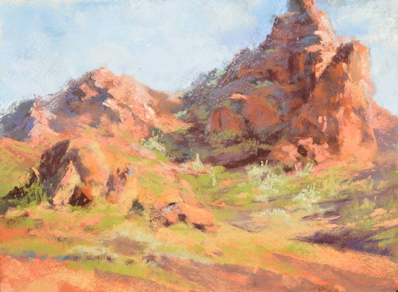 plein air soft pastel painting of red rocky outcrops by Sharon Bamber